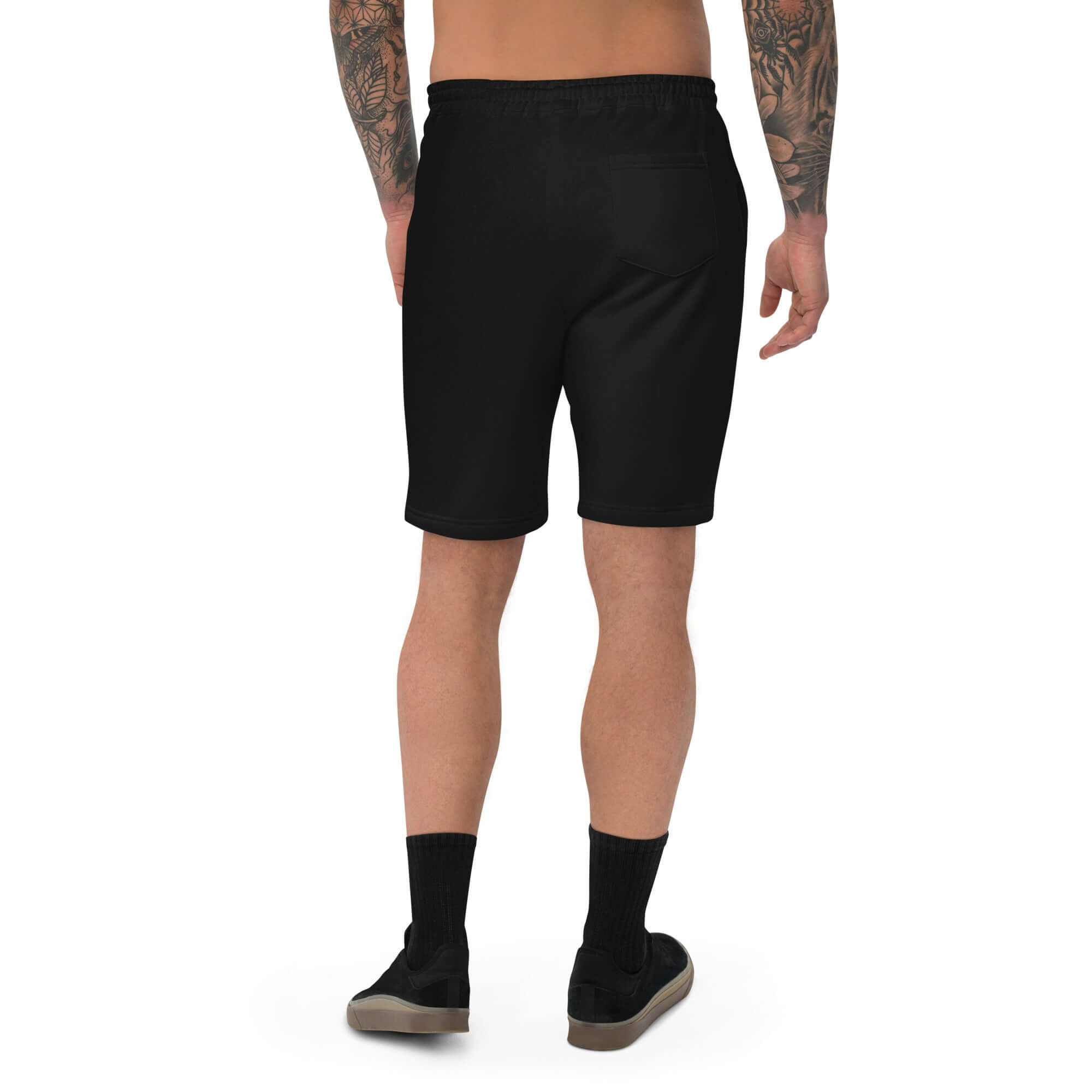 Back view of black above-knee shorts with elastic waistband and drawstring