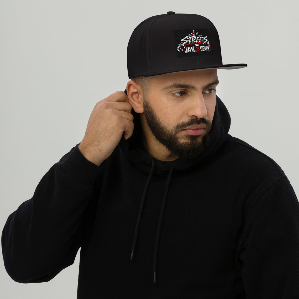 Black snapback hat with embroidered front logo