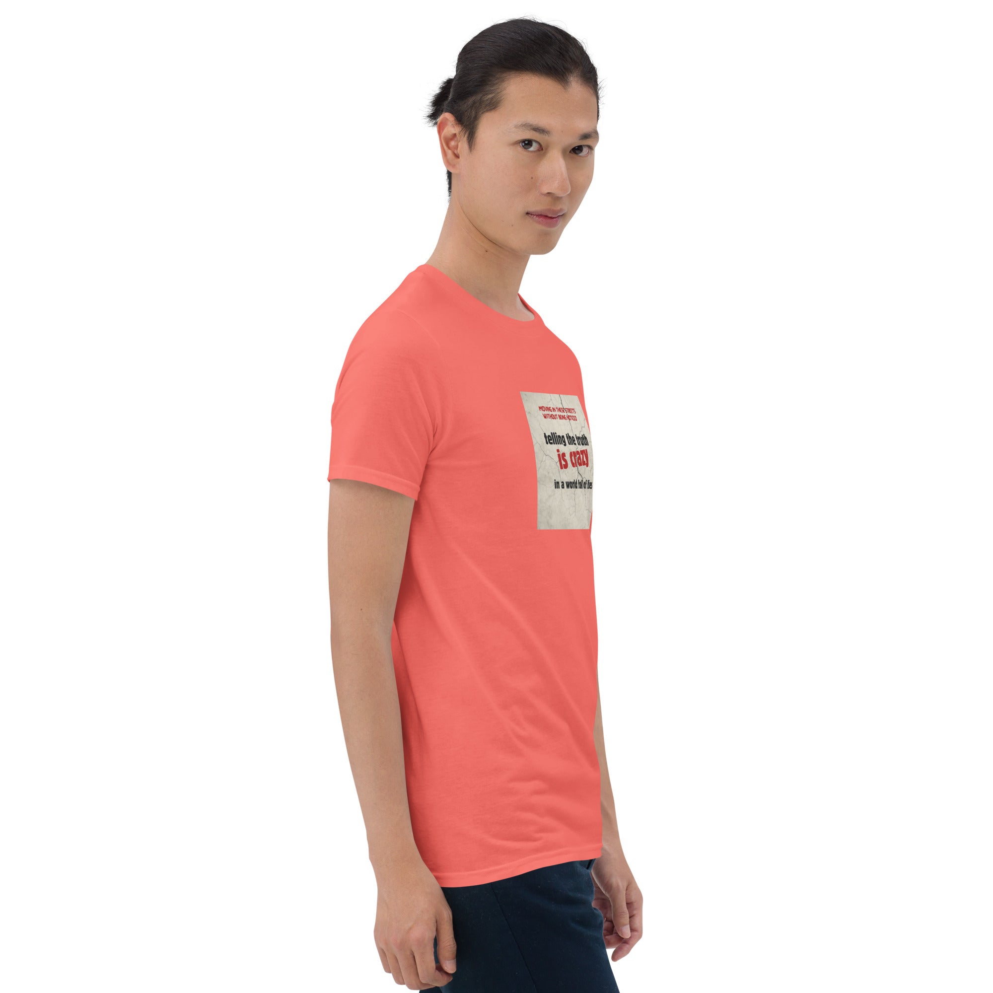 Coral/red T-shirt with chest square text graphic, side angle