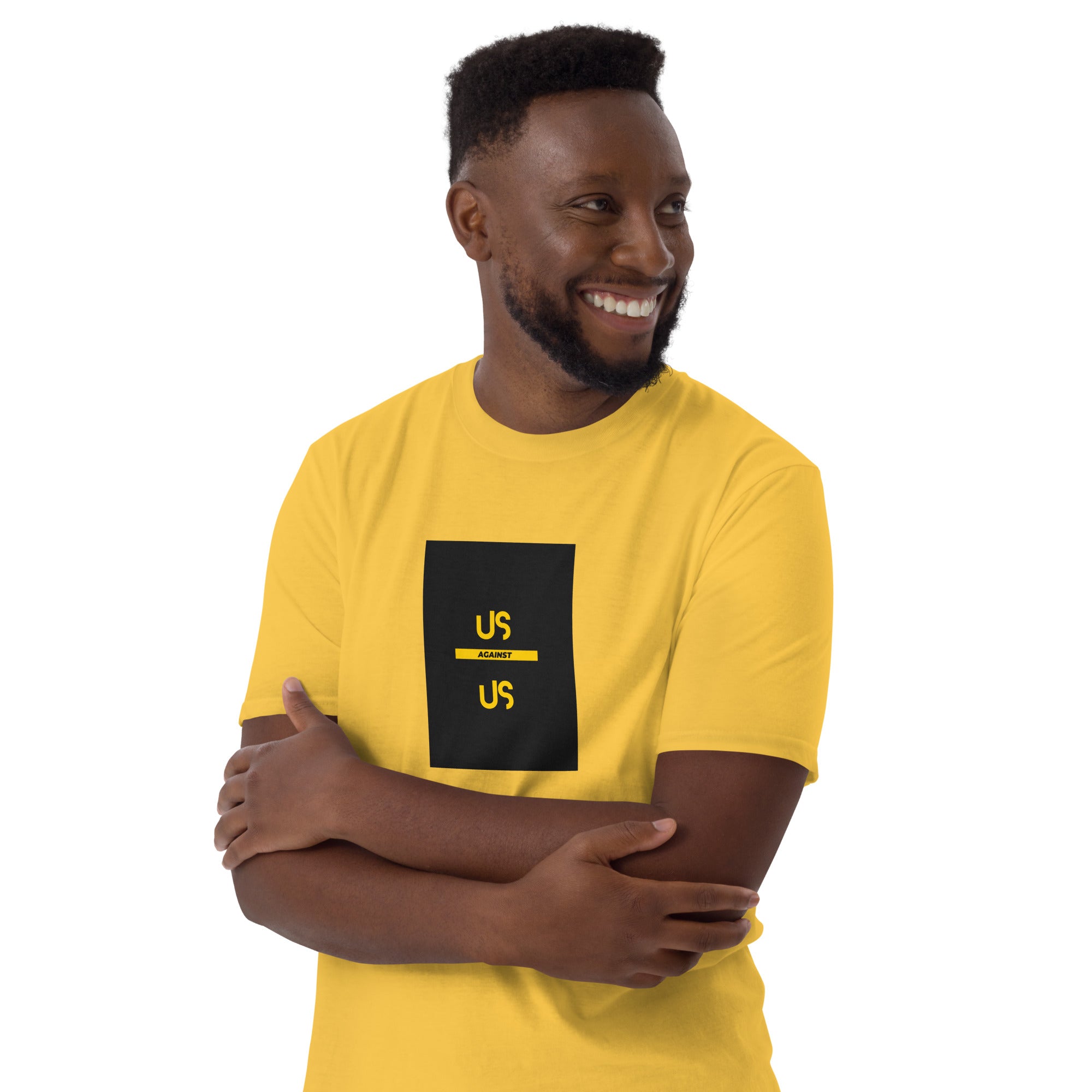 Yellow unisex short-sleeve T-shirt, front square “US AGAINST US” graphic