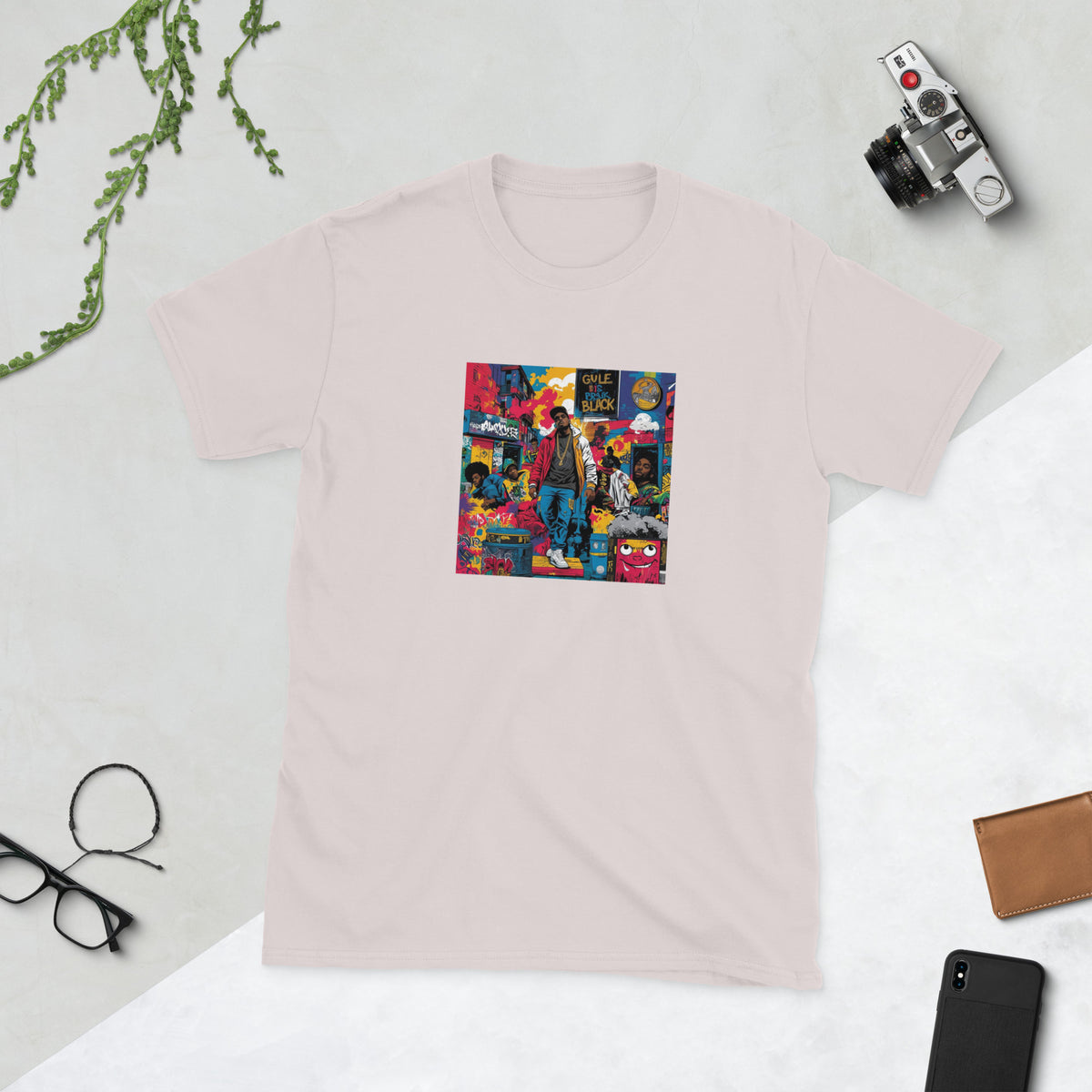 Light pink graphic tee with colorful front chest print