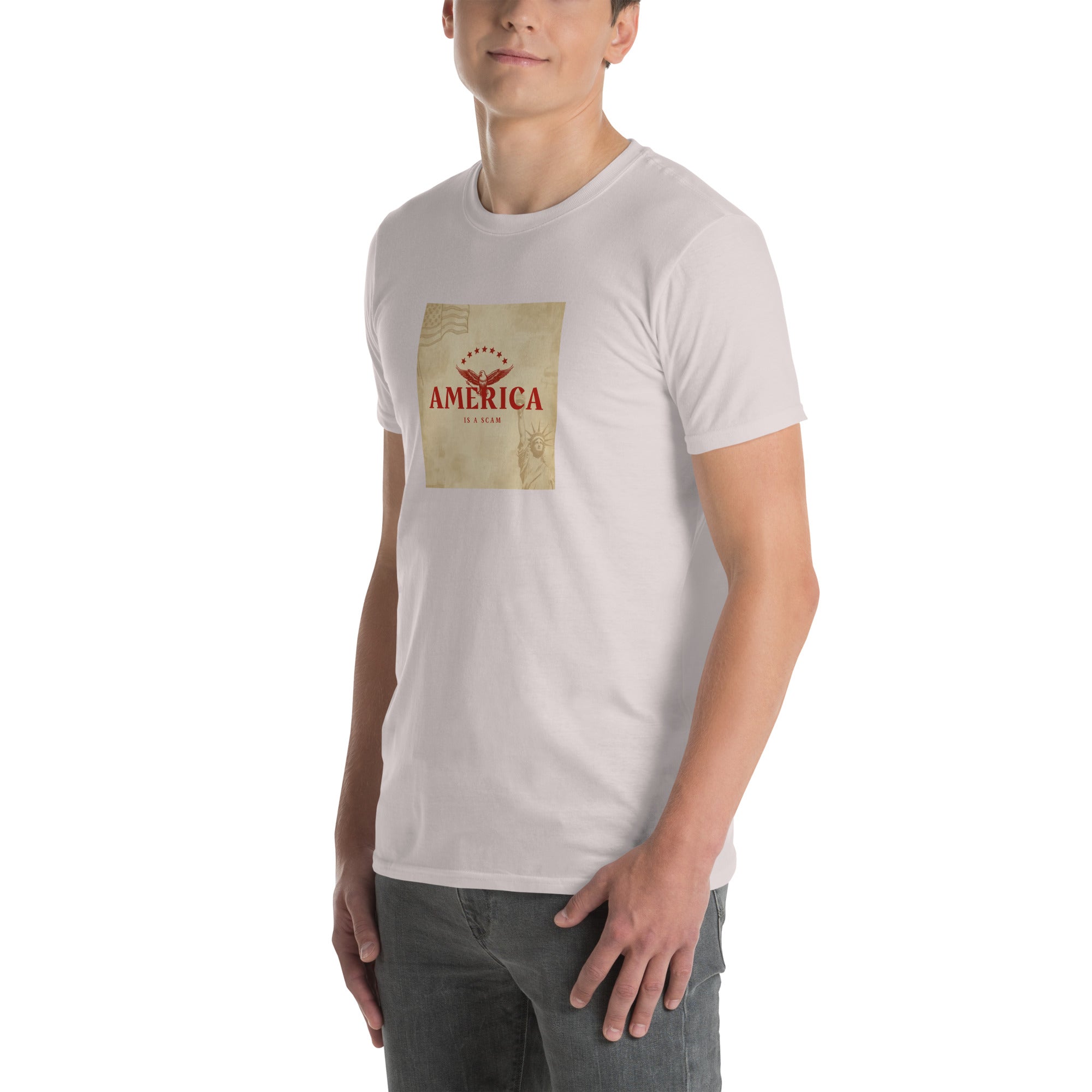 White unisex short-sleeve T-shirt front, square “AMERICA IS A SCAM” graphic.
