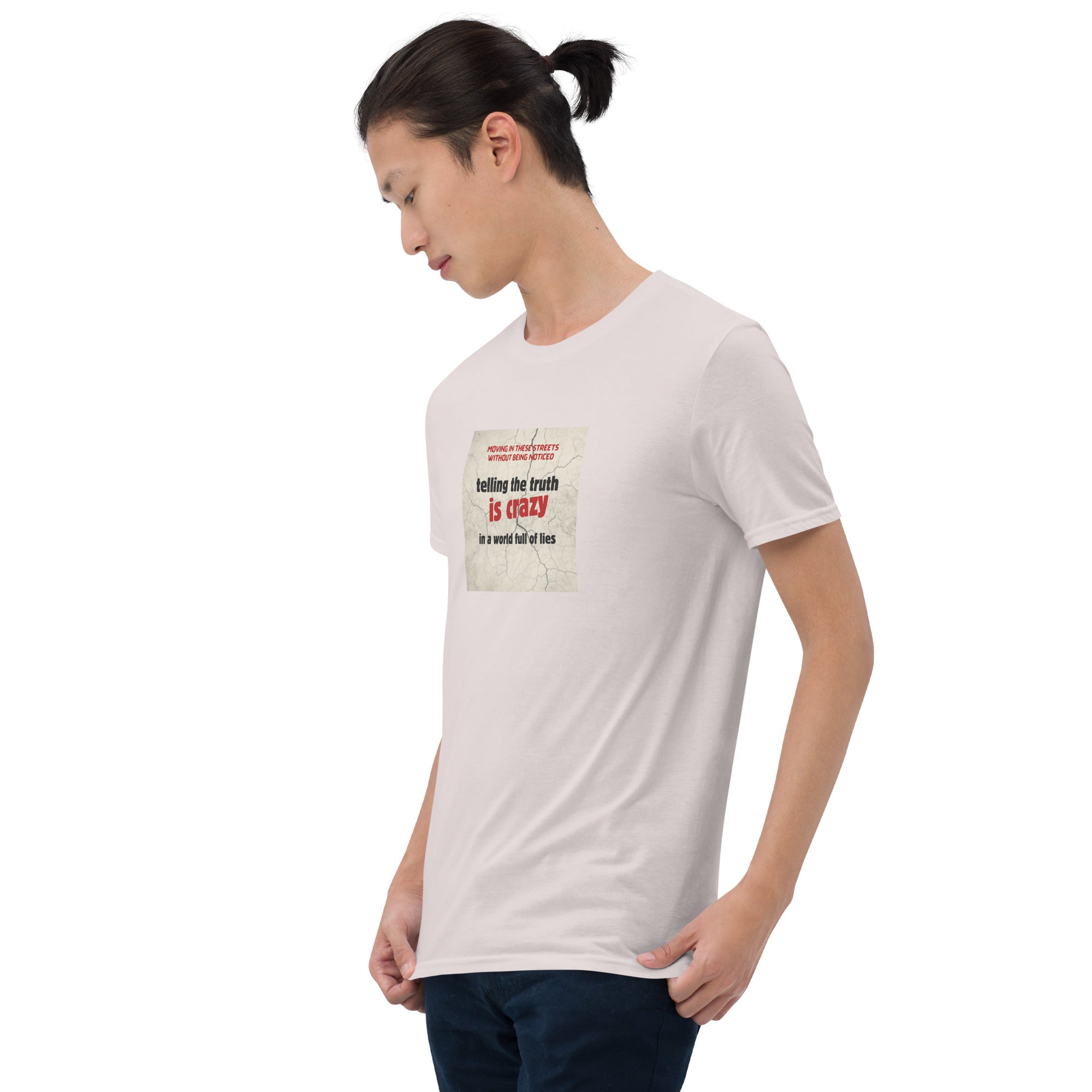 Light T-shirt, angled side front view; square chest print with text slogan.