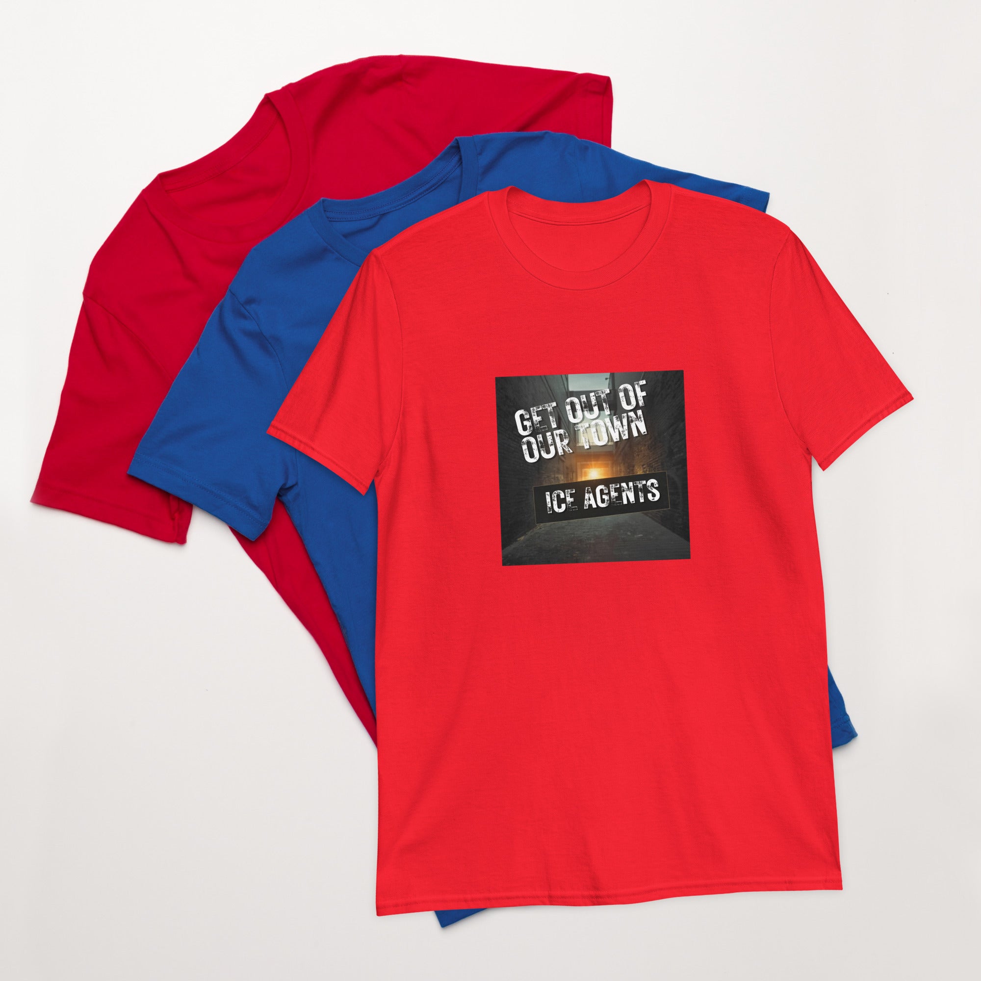 Red unisex T-shirt with square “Get out of our town” graphic; blue and red behind