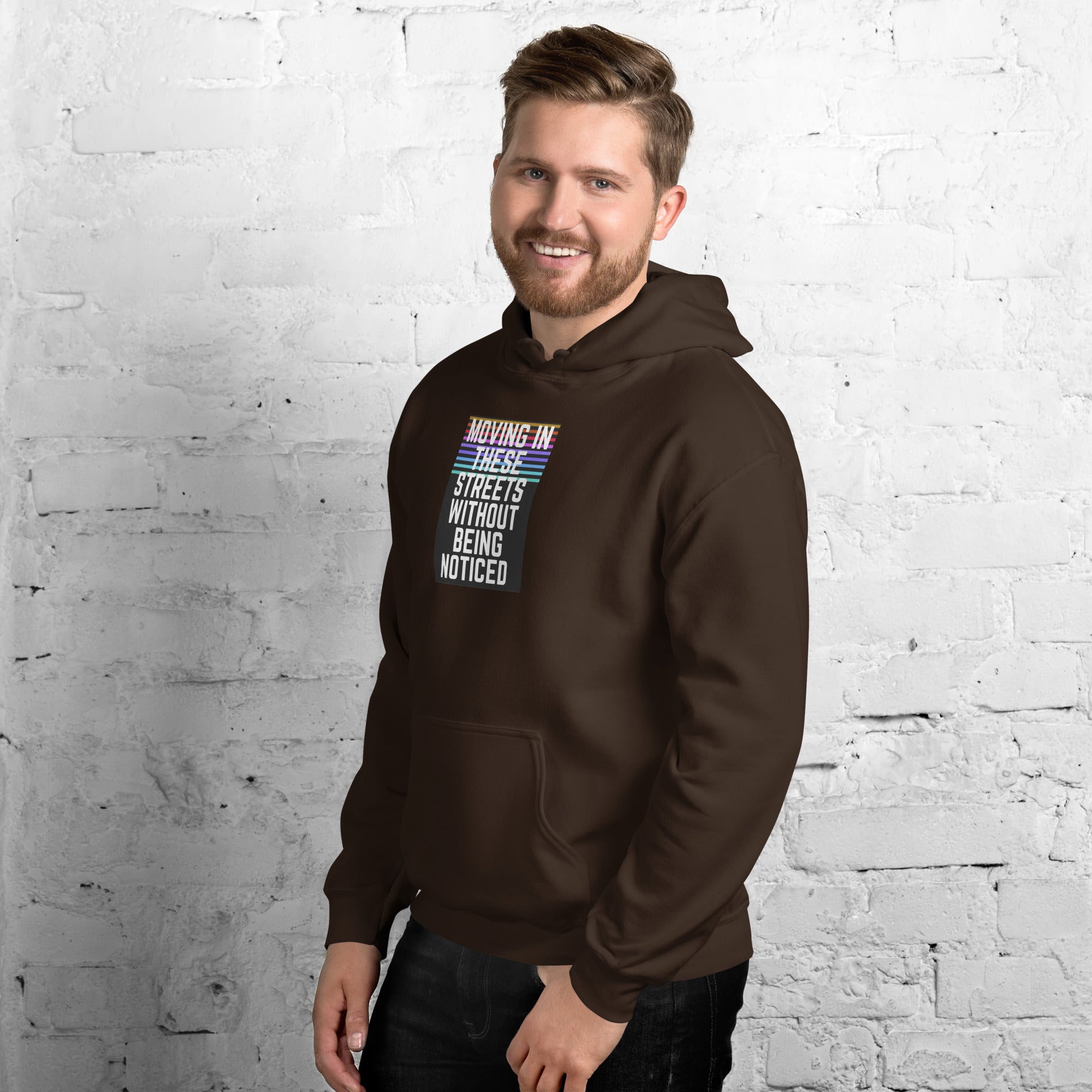 Unisex hoodie, dark brown side view showing sleeve cuff and front logo