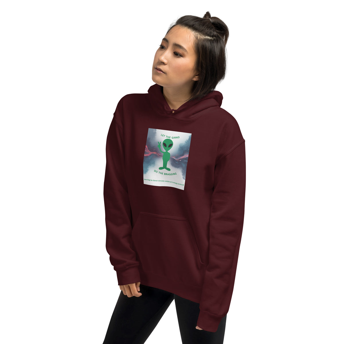 Maroon hoodie with hood, chest graphic print, and front kangaroo pocket