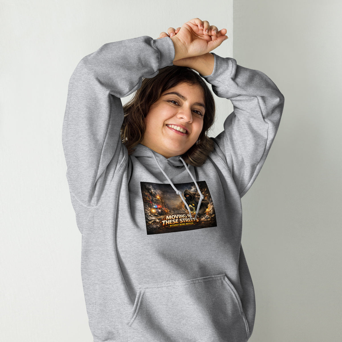 Light gray pullover hoodie with hood, front pocket, and colorful street graphic on chest