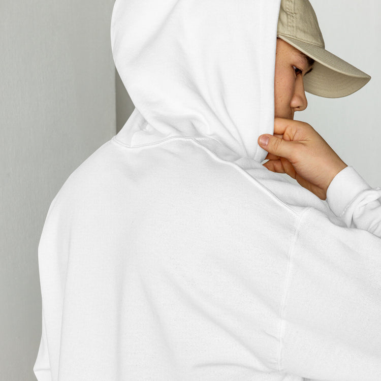 White unisex hoodie with drawstring hood; hand grips fabric near neck opening.