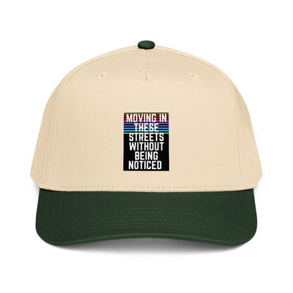 Cream and dark green 5-panel cap with front graphic text