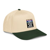 Cream and dark green 5-panel cap with side graphic patch and curved brim