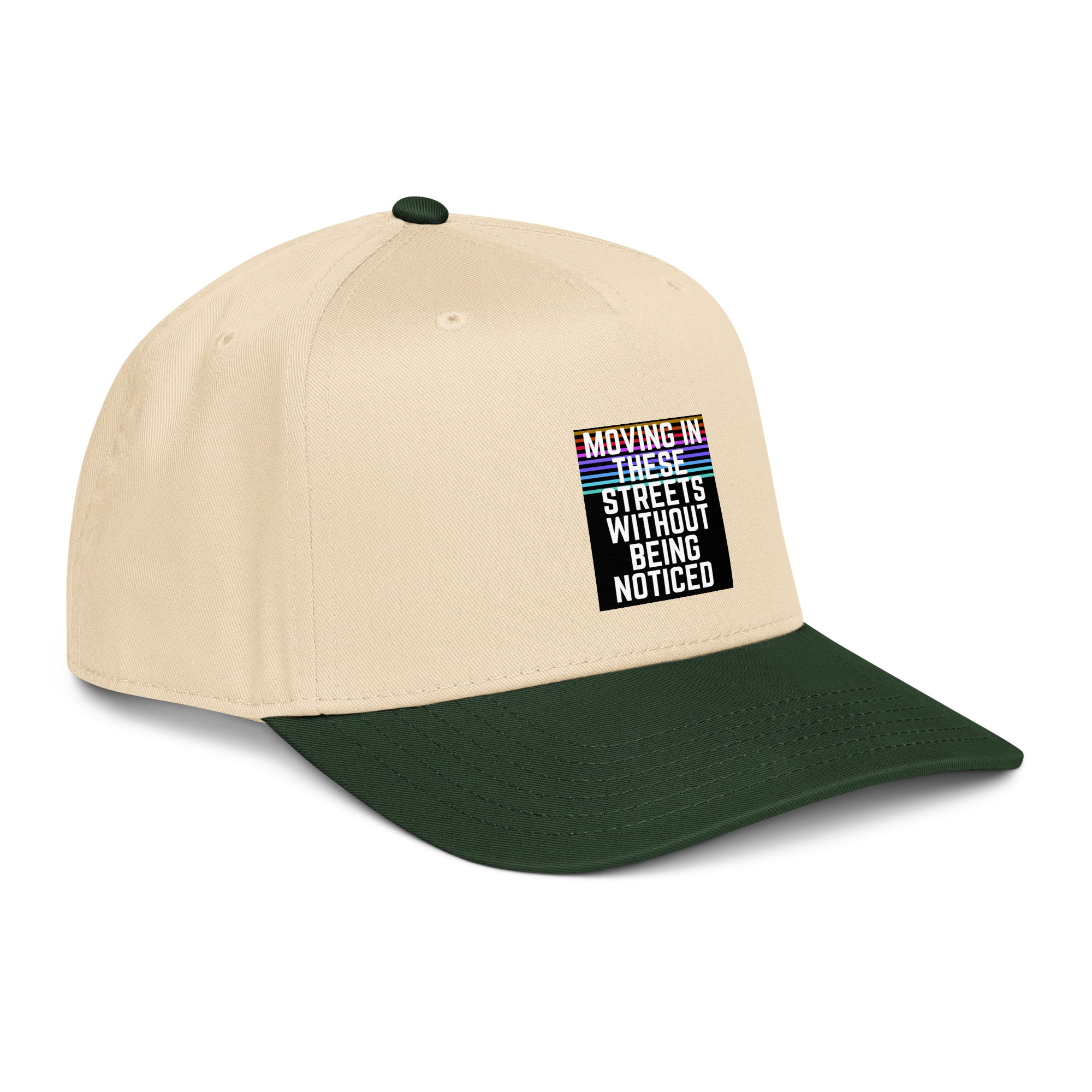 Cream and dark green 5-panel cap, angled side view with graphic label
