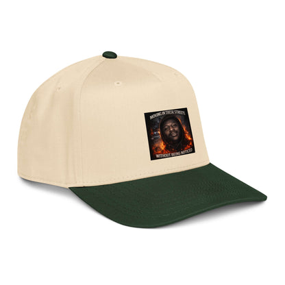 Two-tone dark green and natural 5-panel cap angled view with logo patch