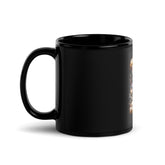 Black ceramic mug with curved handle and glossy finish, plain front view