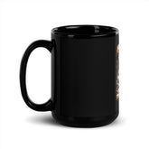 Black ceramic mug angled view, glossy black cup with handle