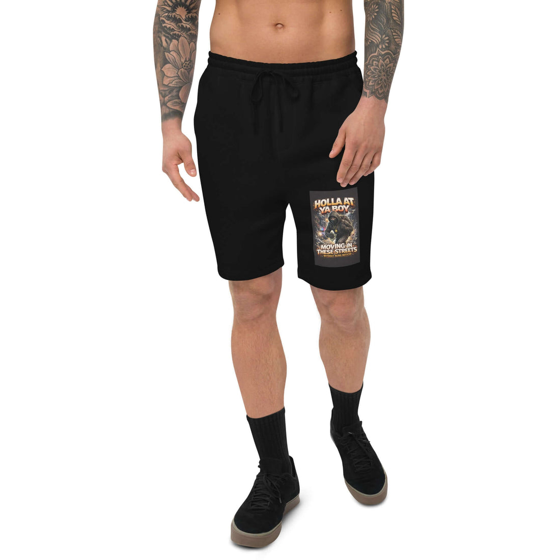 Black shorts with elastic waistband and right-thigh print, above-knee length