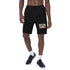 Men’s black fleece shorts with drawstring waist and side pockets, small chest patch detail