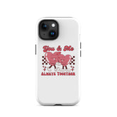 White phone case with red “You & Me” heart design and side button cutouts