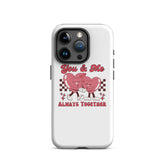 White phone case with red heart couple, “You & Me” script, and visible camera module