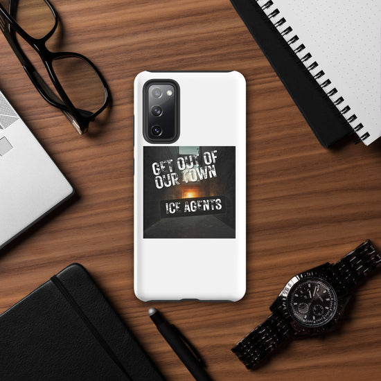 White Samsung phone case with “Get Out Of Our Town” “Ice Agents” graphic on front.