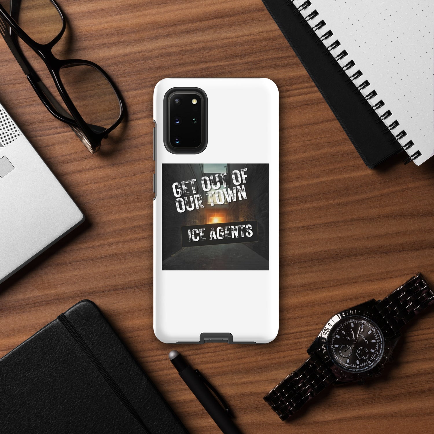Black camera module on white phone case with “Ice Agents” street-style slogan print.