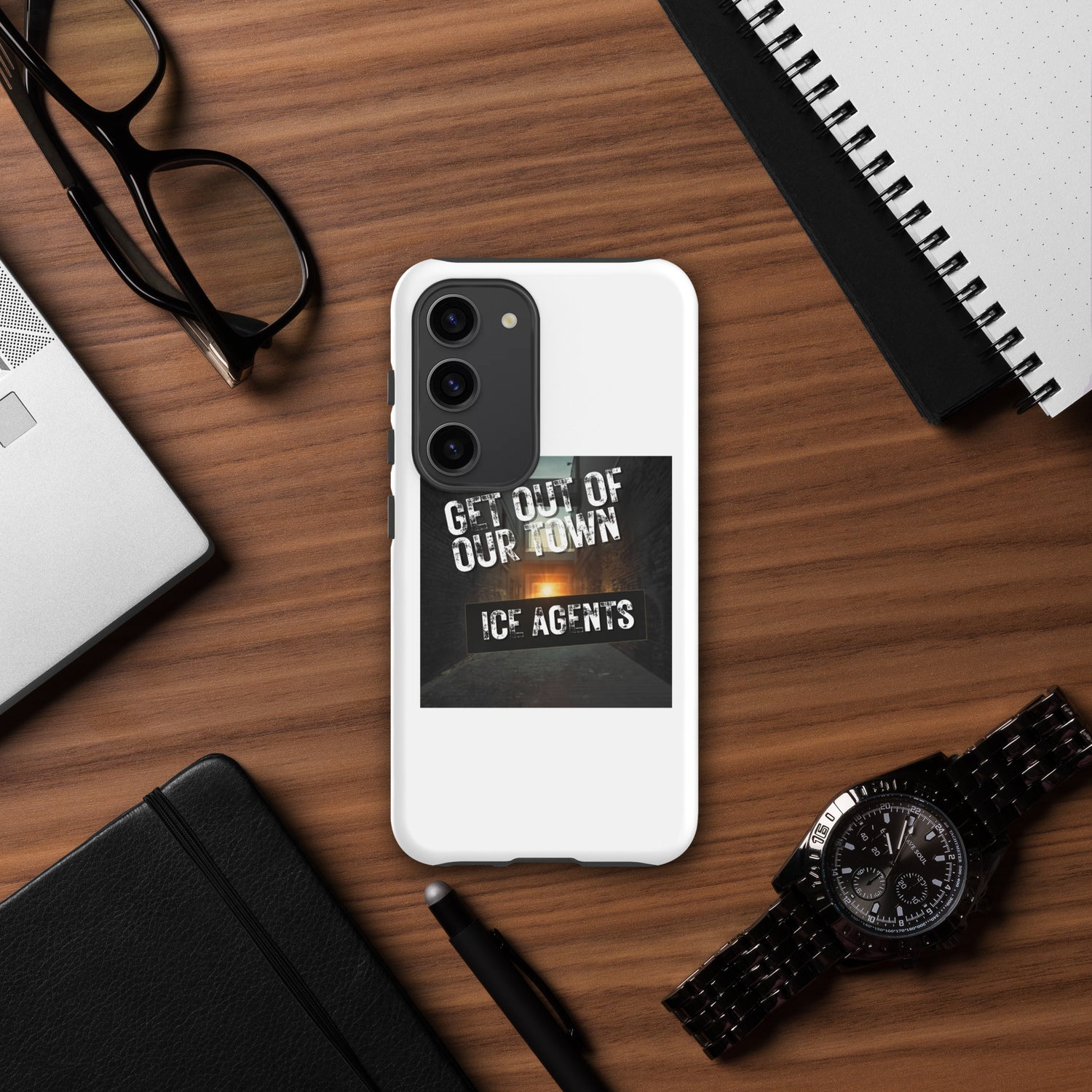 White smartphone case with black camera guard and “ICE AGENTS” slogan artwork