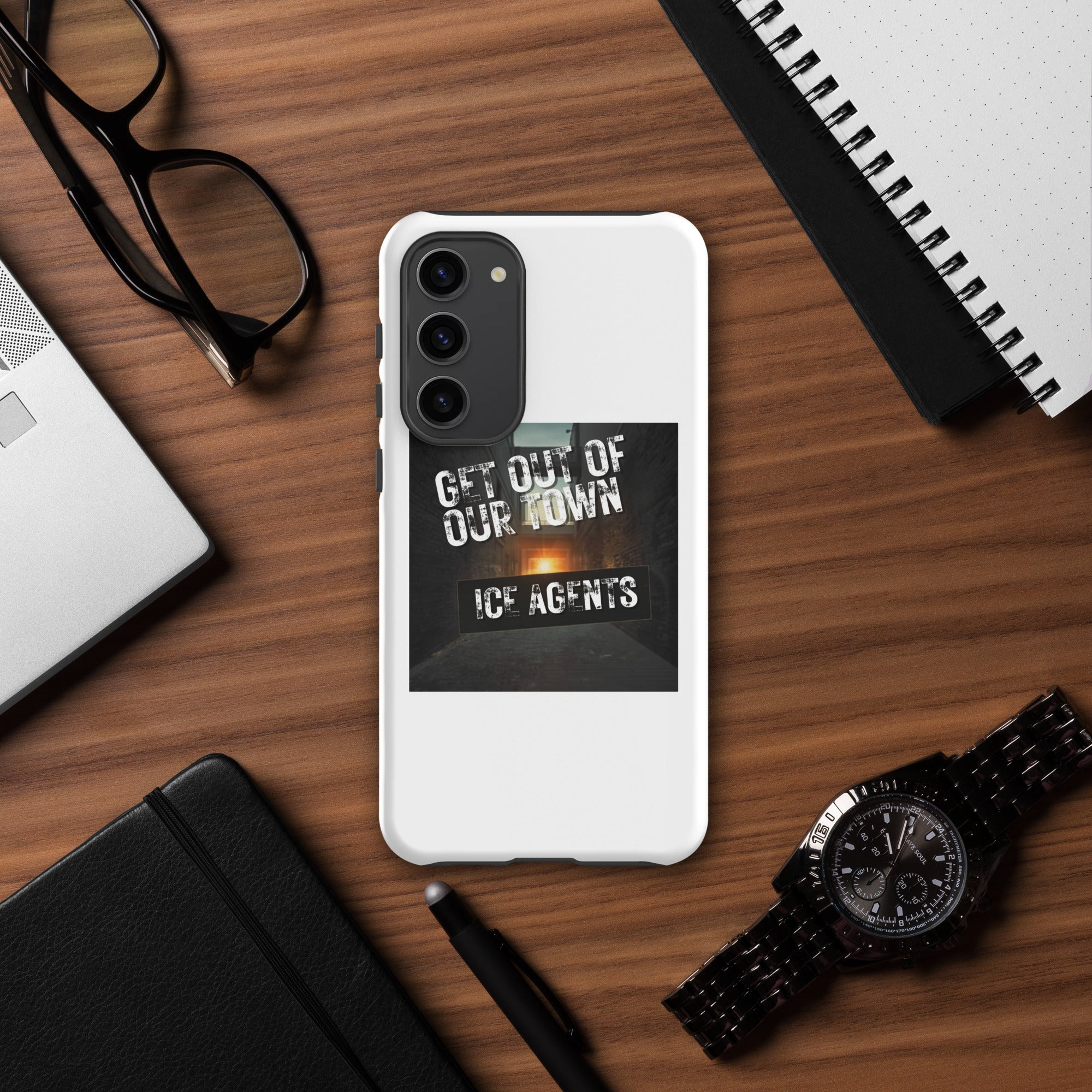 White rear phone case featuring “GET OUT OF OUR TOWN” and “ICE AGENTS” text