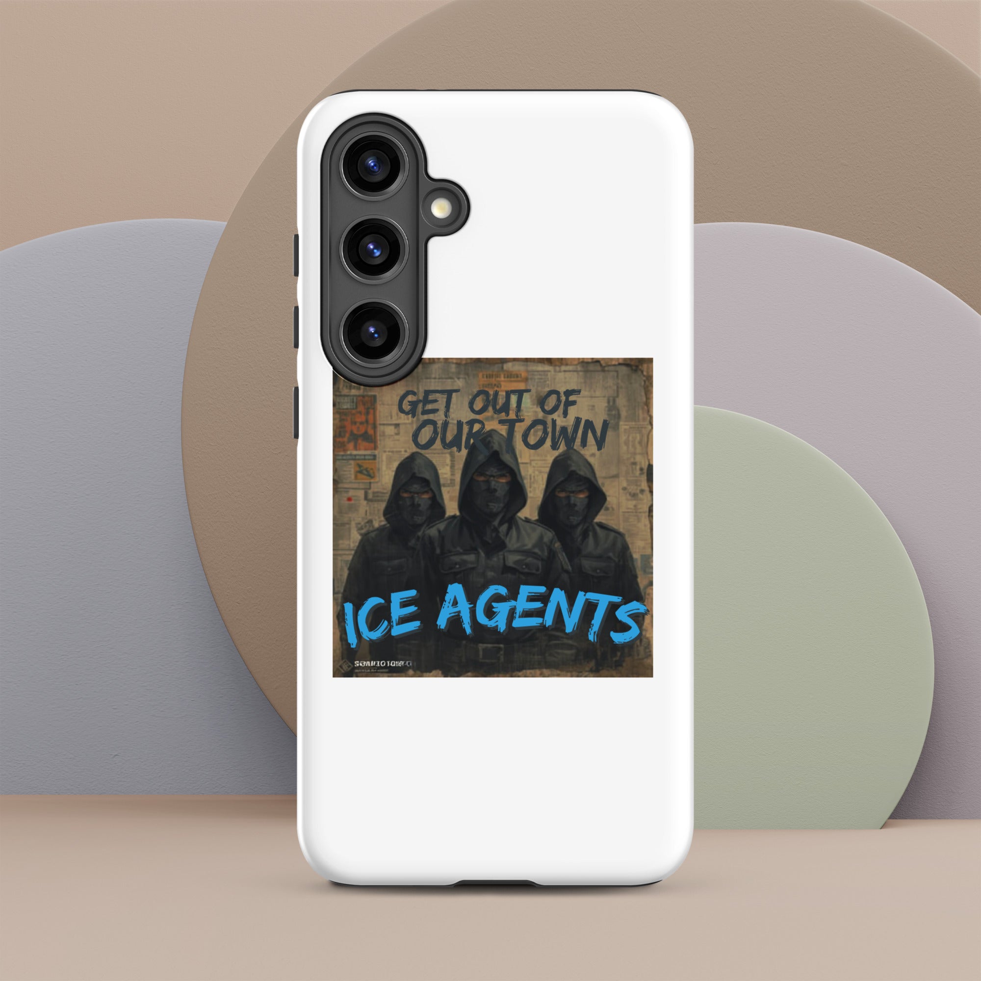 White rugged phone case with “GET OUT OF OUR TOWN” banner and rear camera cutouts