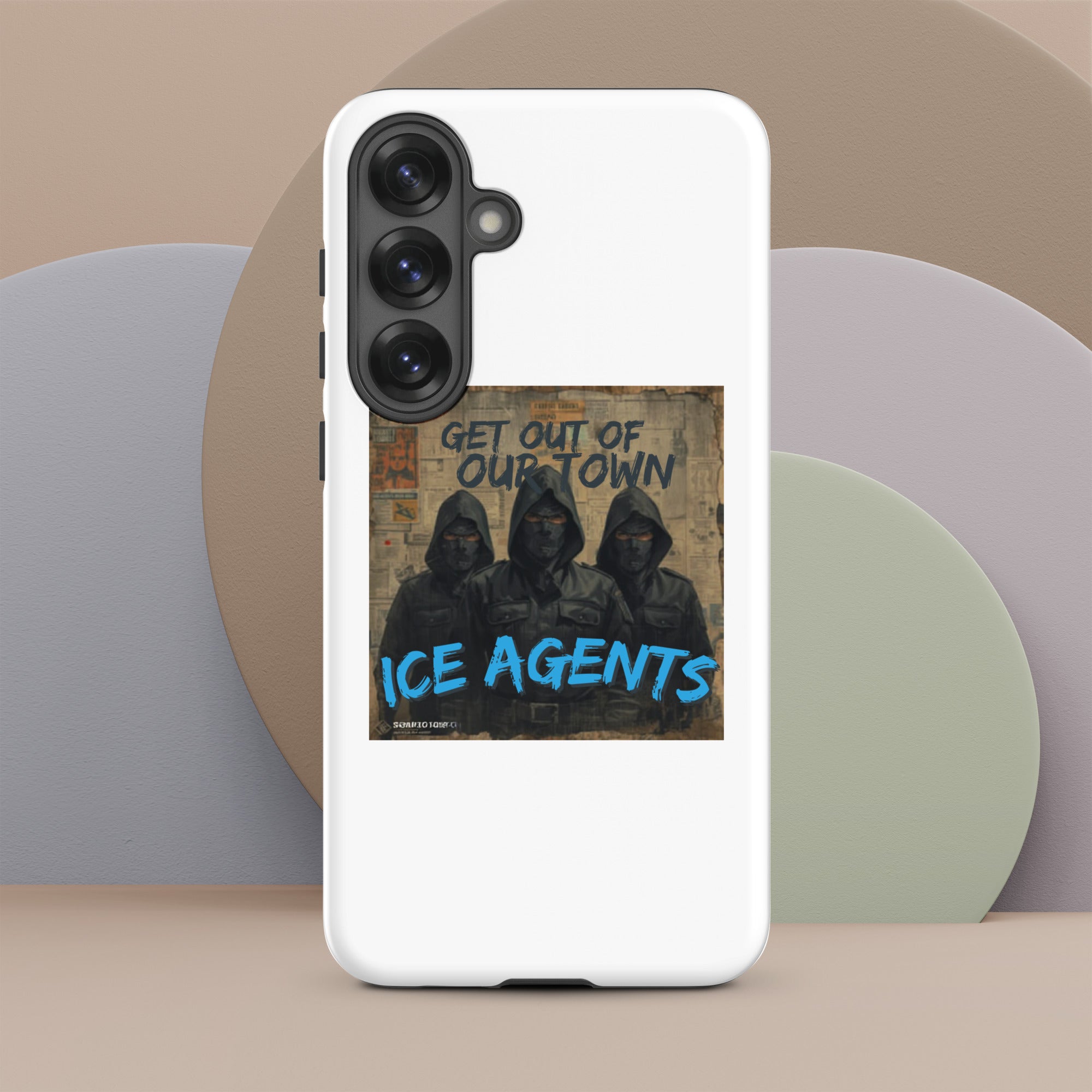 White phone case showing “GET OUT OF OUR TOWN” and “ICE AGENTS” graphic