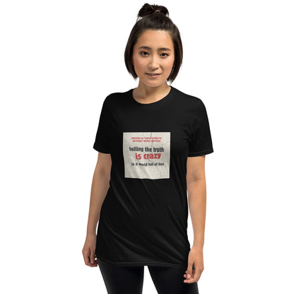 Unisex black graphic t-shirt with front square “telling the truth is crazy” print