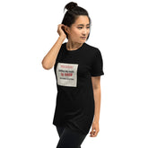 Unisex black graphic t-shirt with front square “telling the truth is crazy” print