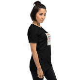 Unisex black graphic t-shirt, side view with small sleeve square text print