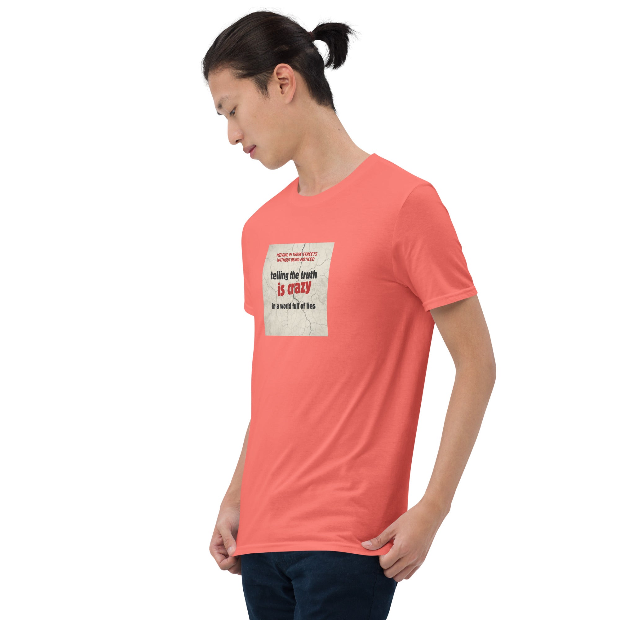 Coral/red T-shirt front view with square “telling the truth is crazy” print