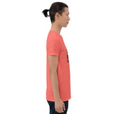 Coral unisex short-sleeve T-shirt with graphic print detail on the left side seam.