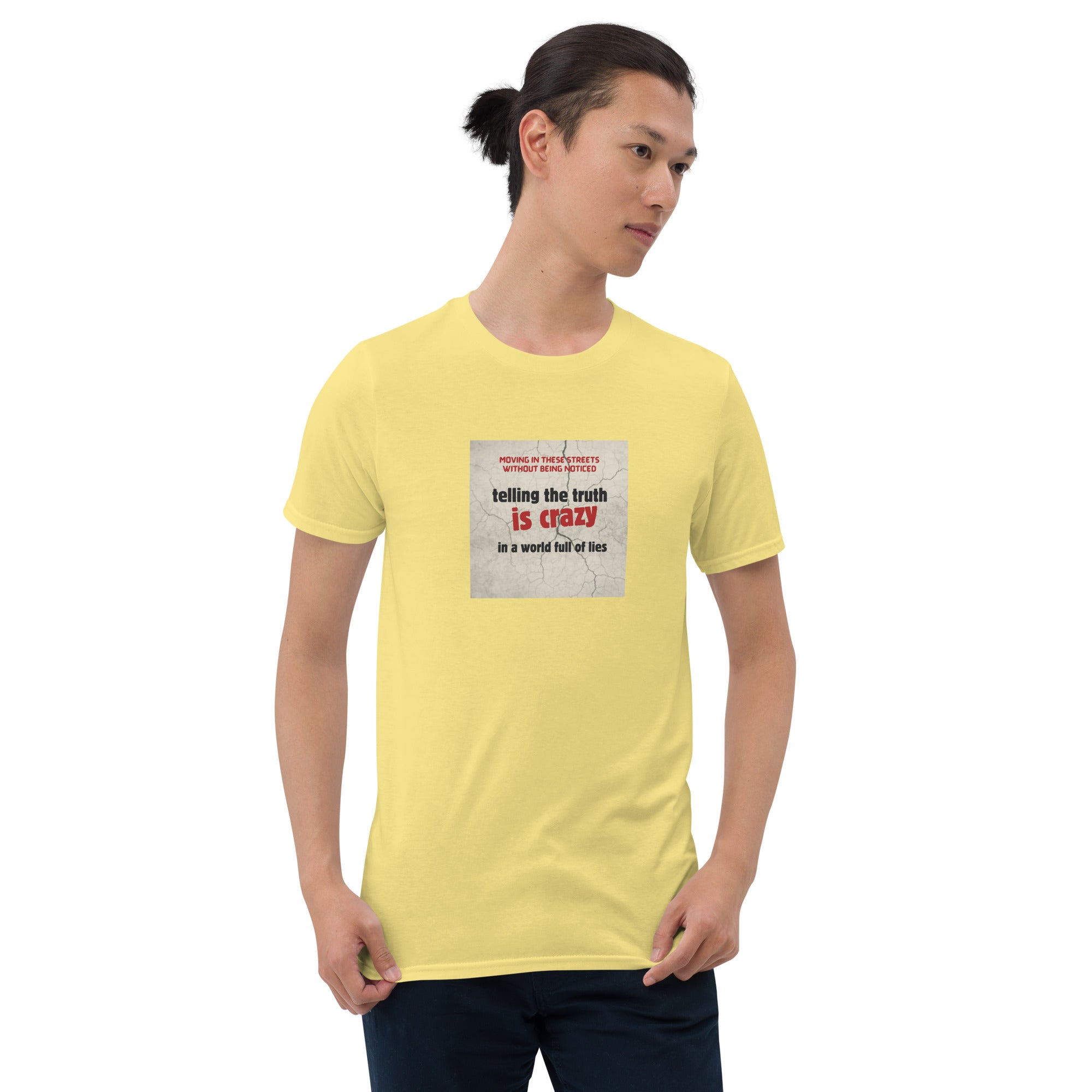 Yellow T-shirt with short sleeves and crew neck; square chest slogan graphic.