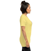 Yellow unisex t-shirt on model, side view, short sleeves and crew neck