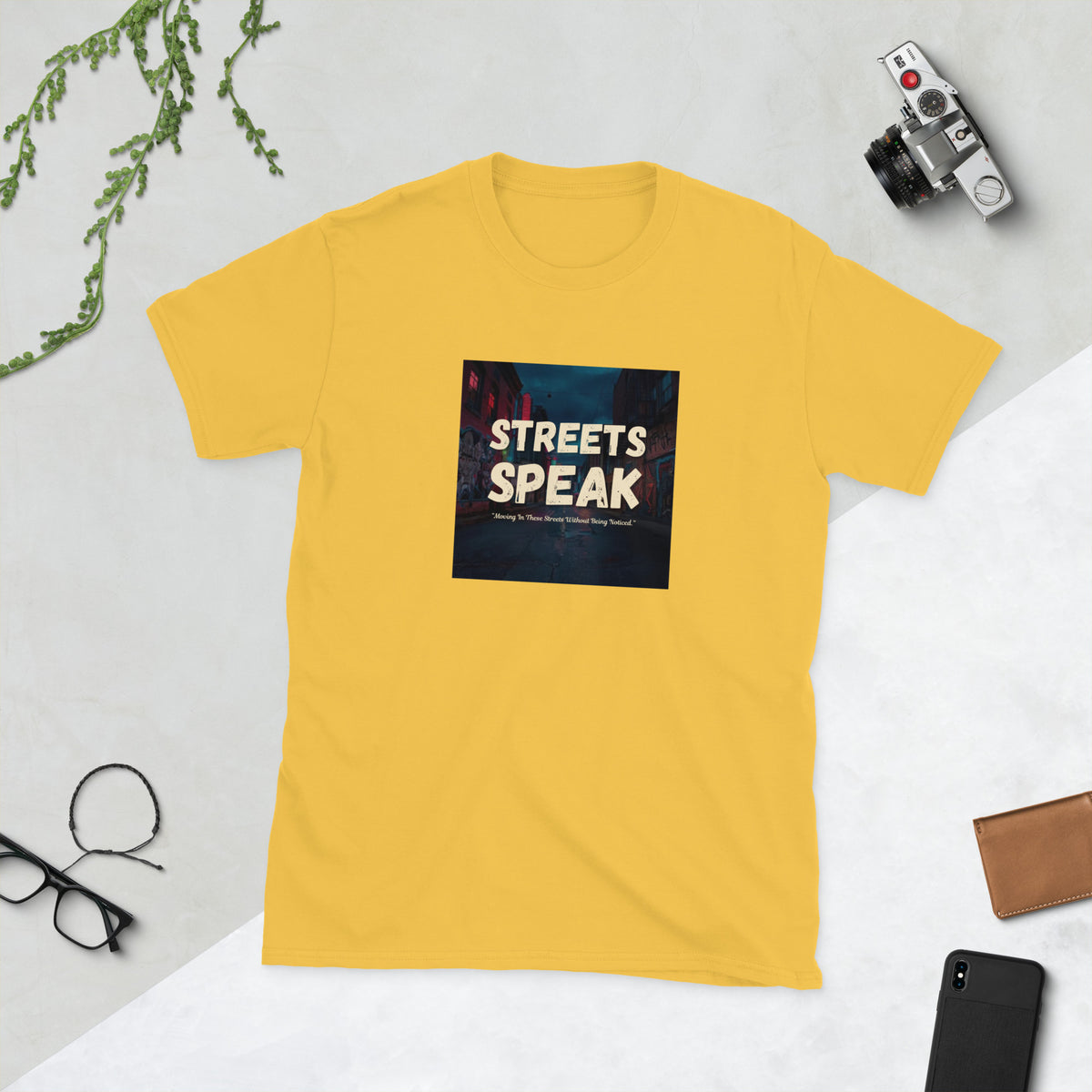Yellow graphic crewneck T-shirt with square “STREETS SPEAK” logo