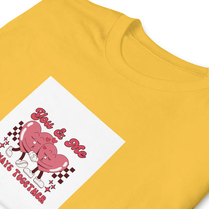 Yellow graphic tee close-up of &
