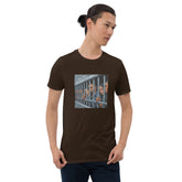 Dark brown graphic crew-neck T-shirt with front photo of a man behind bars