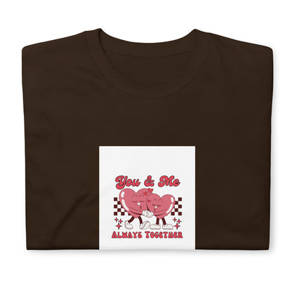 Dark brown graphic tee with “You &amp; Me” pink couple and checker heart design