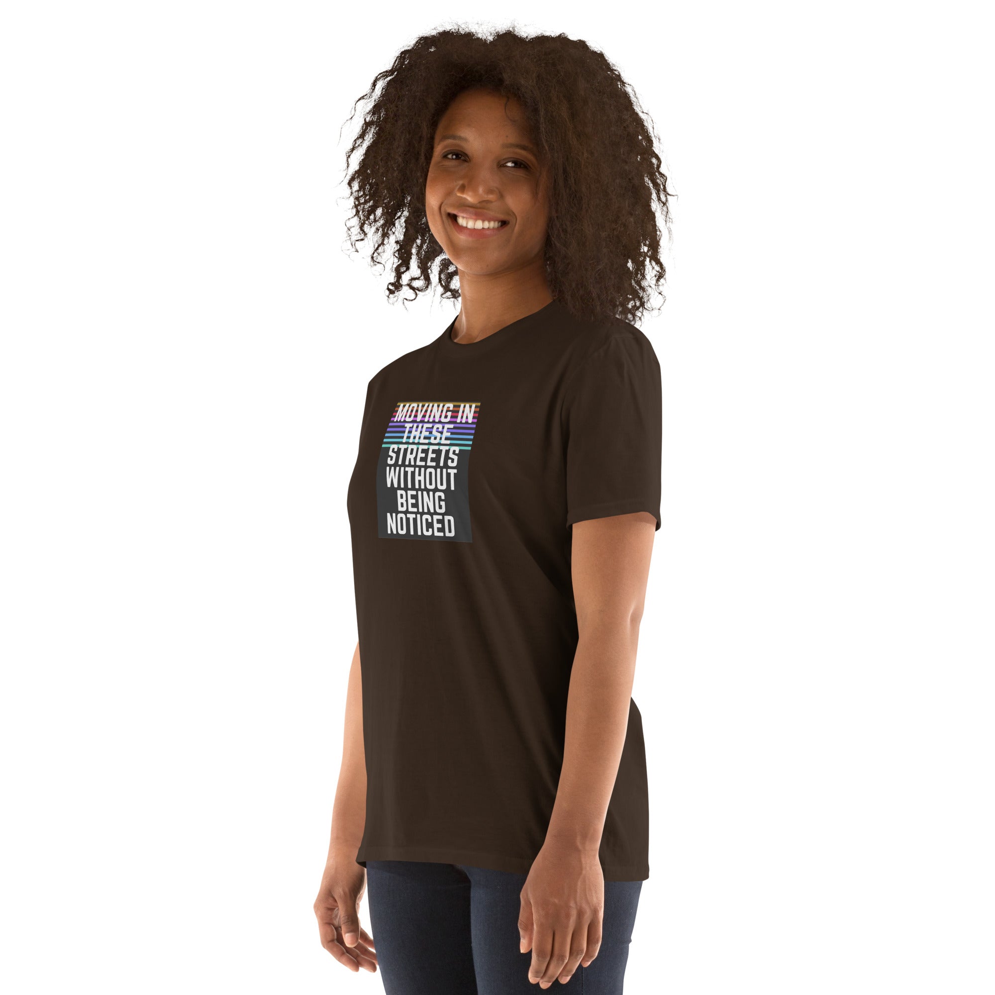 Dark chocolate T-shirt front view with multi-line “Moving In These Streets Without Being Noticed”