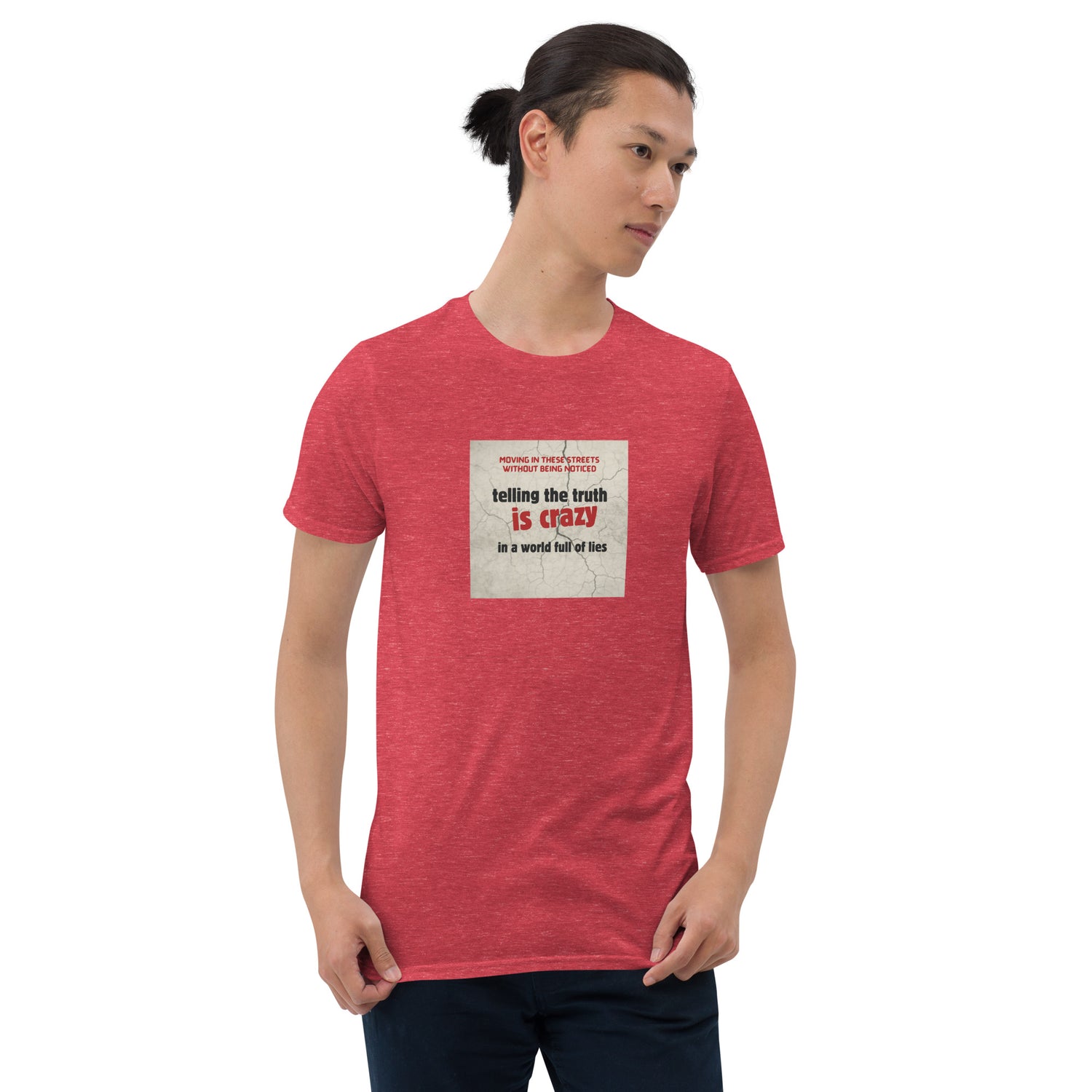 Red heather T-shirt with front square graphic text: “telling the truth is crazy”