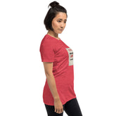 Red unisex T-shirt with chest graphic shown from a side angle.