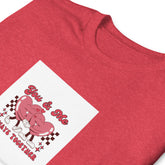 Red graphic tee close-up of &