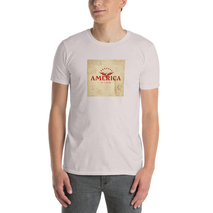 White unisex T-shirt with chest graphic reading “AMERICA IS A SCAM”.