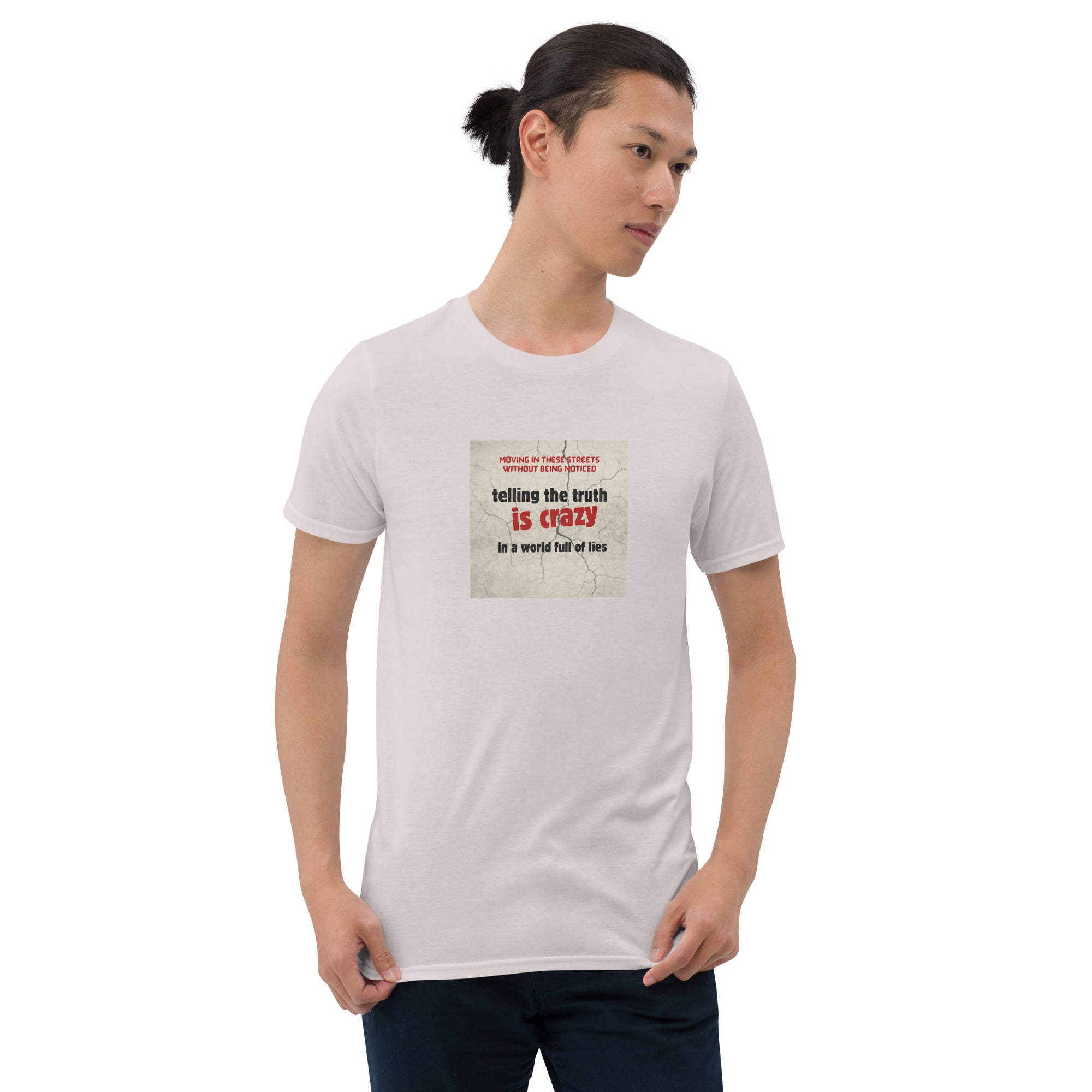 Light T-shirt with short sleeves and crew neck; front square chest slogan graphic.