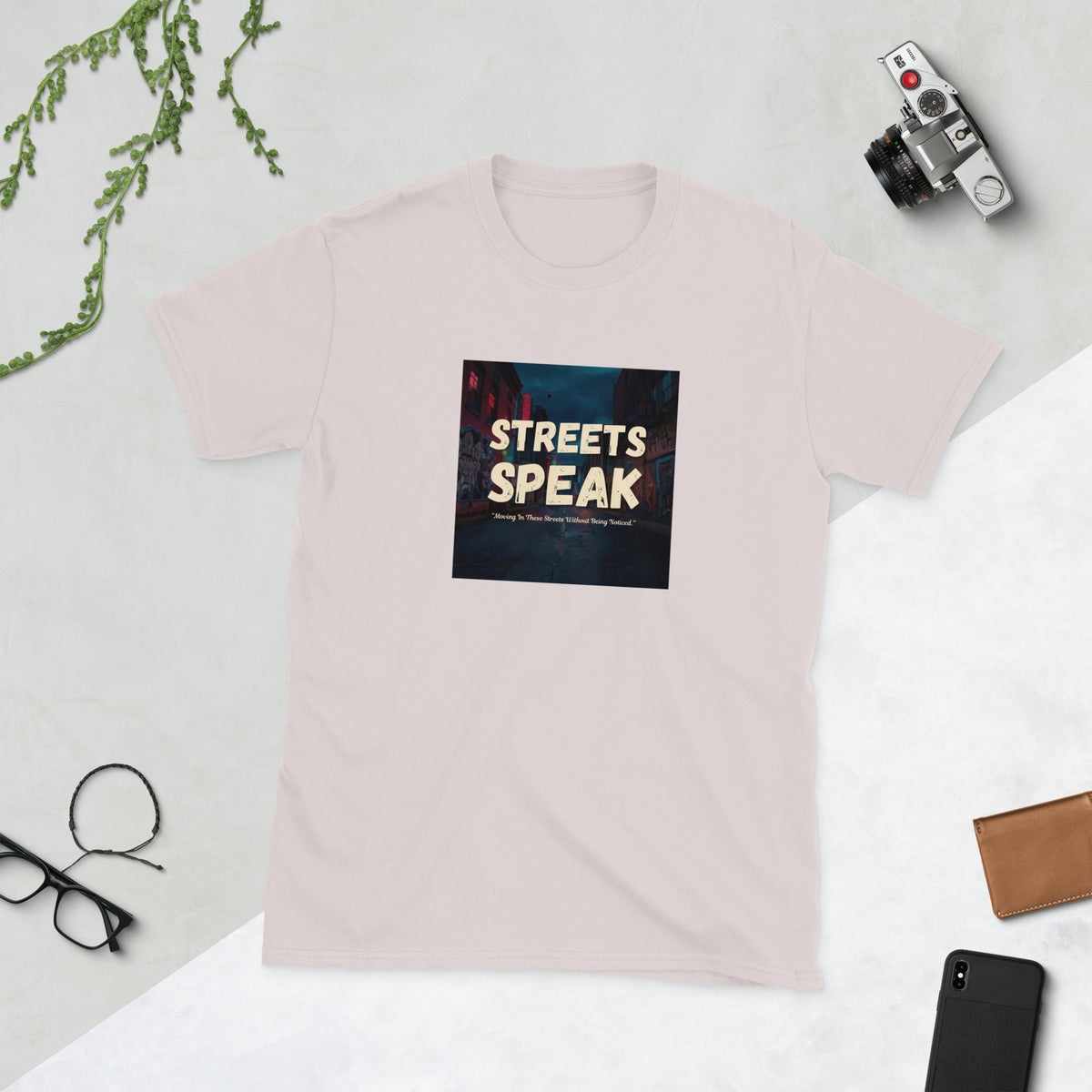 Light pink graphic crewneck T-shirt with square “STREETS SPEAK” logo