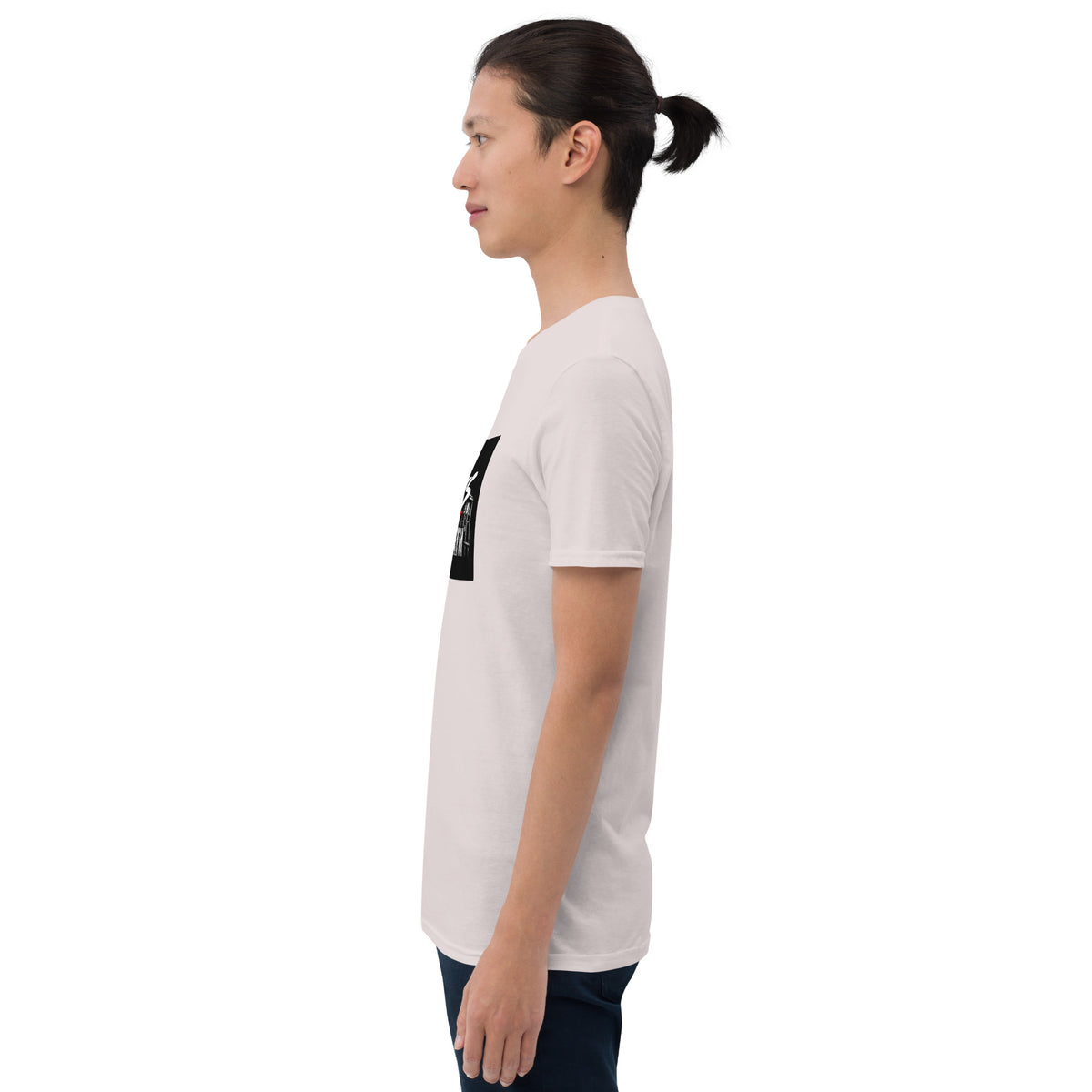 White unisex T-shirt side view showing short sleeves and partial front graphic