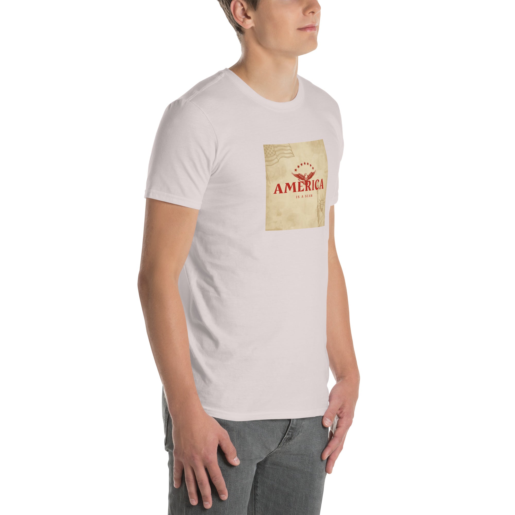 White unisex T-shirt, side view; square “America Is A Scam” print on front.