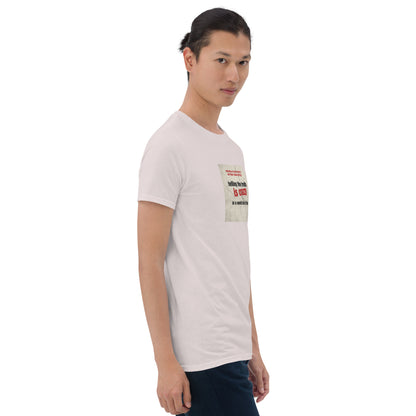 Light T-shirt, front three-quarter view; square chest graphic with readable slogan.