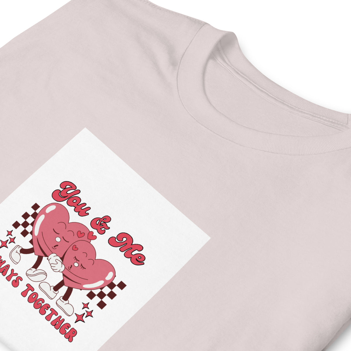 Light pink graphic tee close-up of &